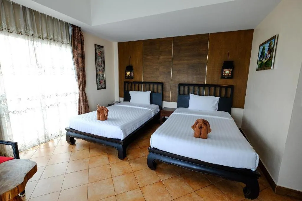 Bed in Red Balcony Hotel