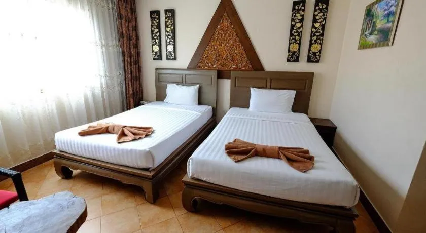 Bed in Red Balcony Hotel