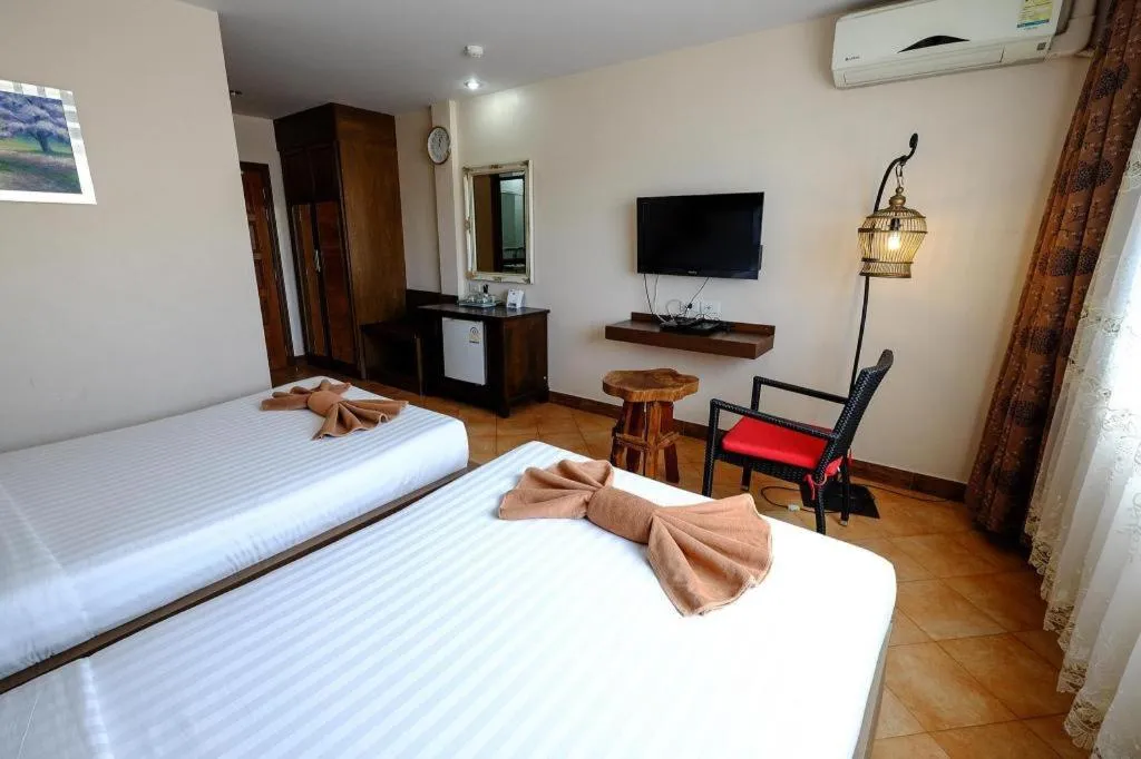 Bed in Red Balcony Hotel