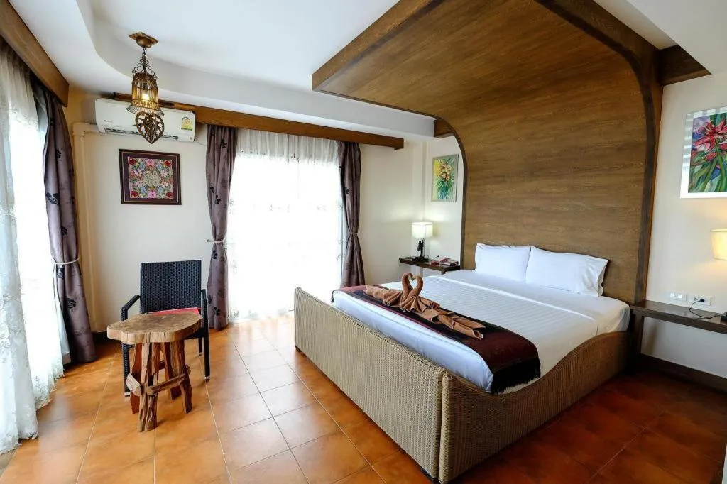 Bed in Red Balcony Hotel