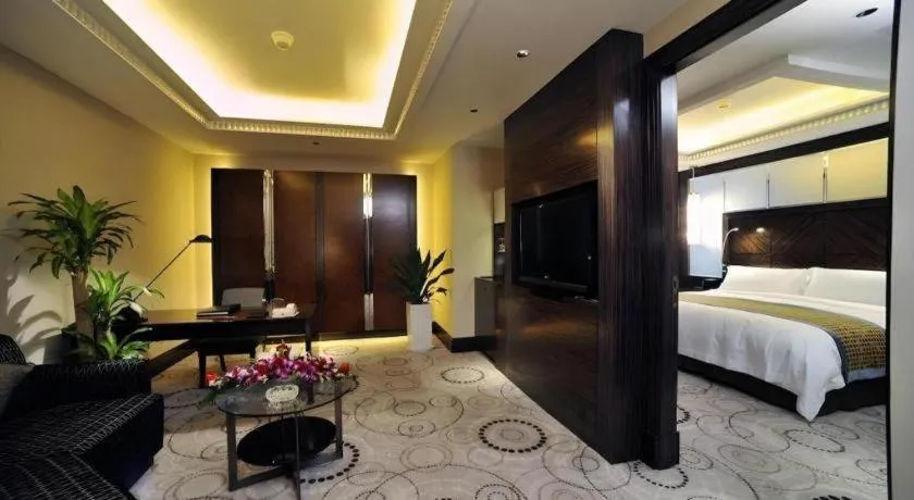 Bed in Grand Soluxe Zhongyou Hotel