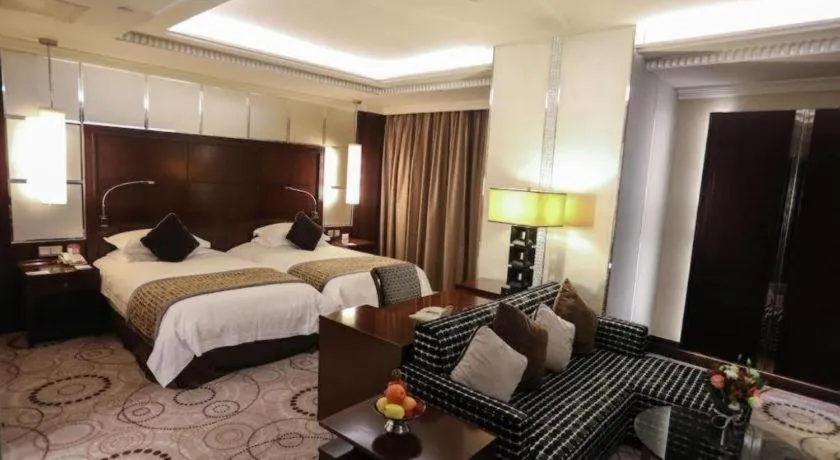 Bed in Grand Soluxe Zhongyou Hotel
