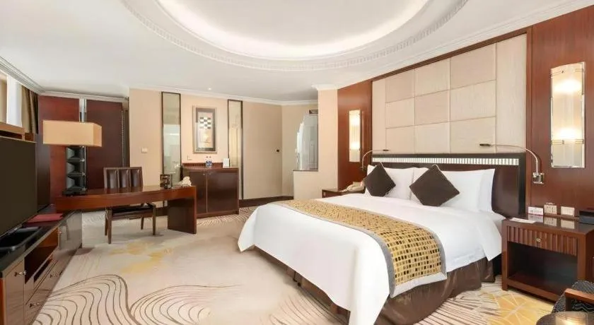 Bed in Grand Soluxe Zhongyou Hotel