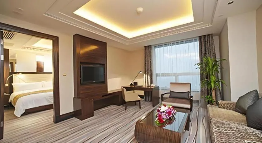 Bed in Grand Soluxe Zhongyou Hotel