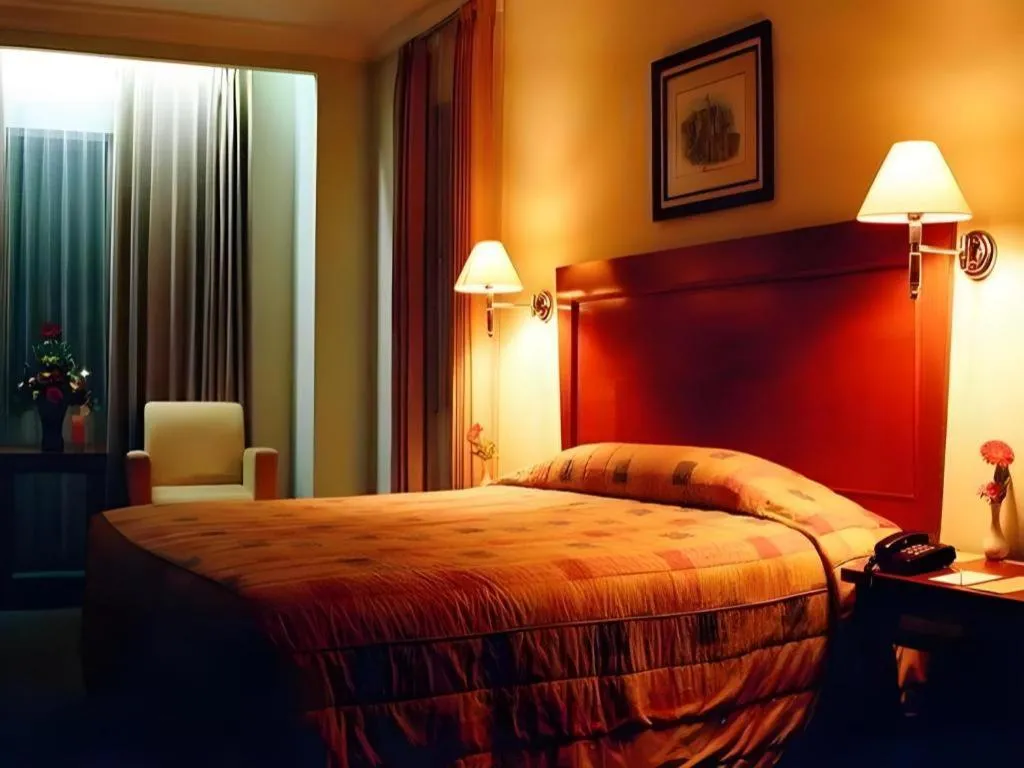 Bed in Nalendra Hotel