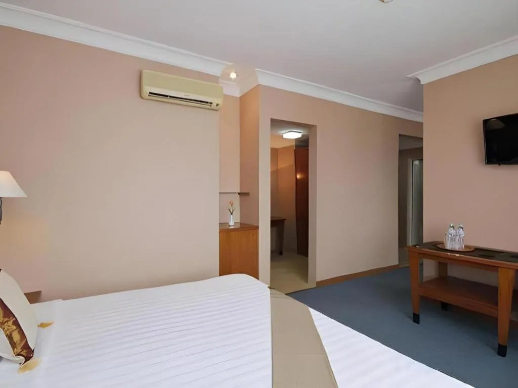 Bed in Nalendra Hotel