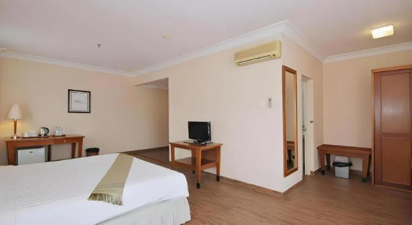 Bed in Nalendra Hotel