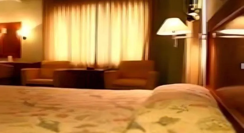 Bed in Nalendra Hotel