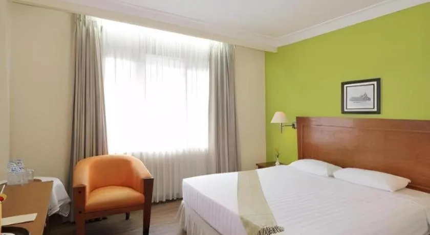 Bed in Nalendra Hotel