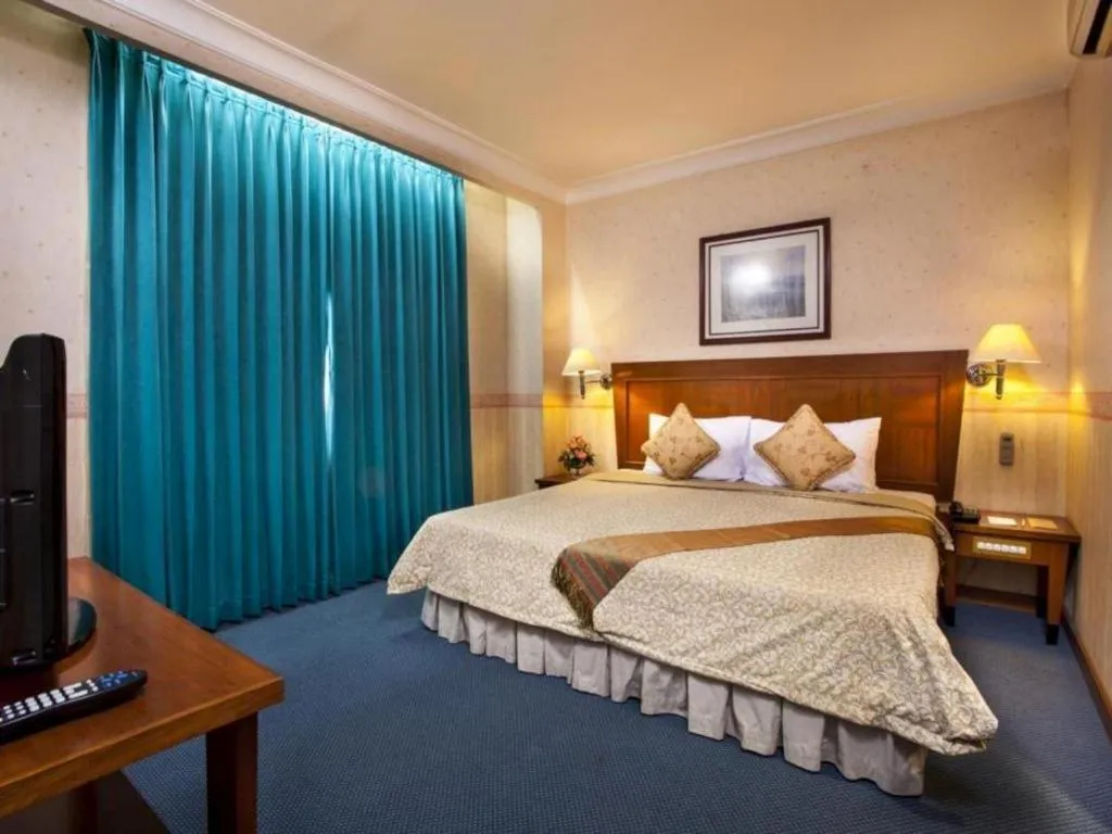 Bed in Nalendra Hotel