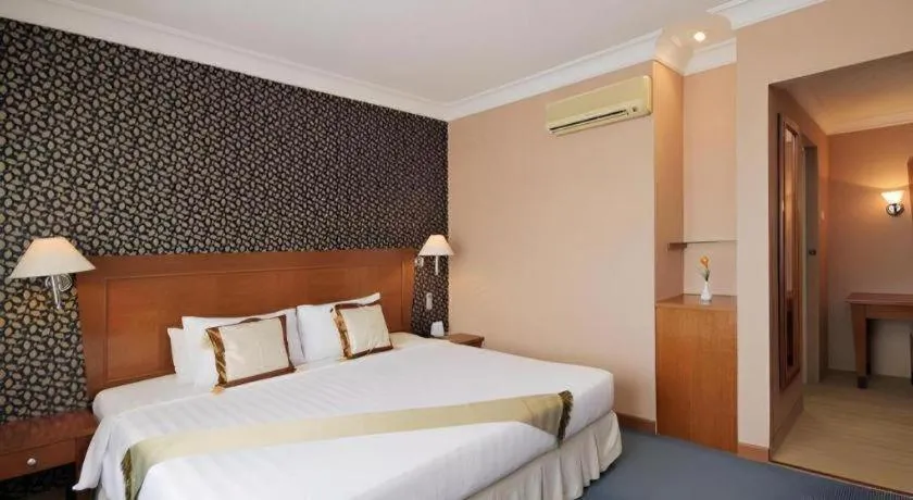 Bed in Nalendra Hotel