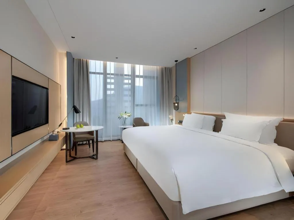 Bed in Hongfeng Hotel Nanshan Branch