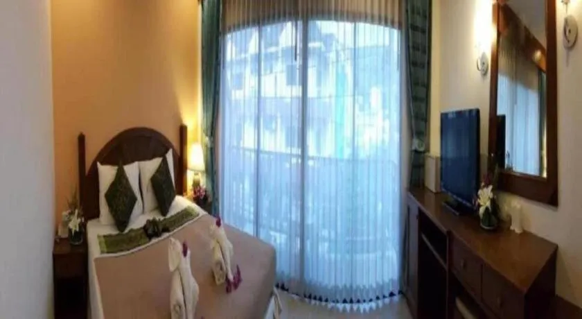 Bed in MT Hotel Patong