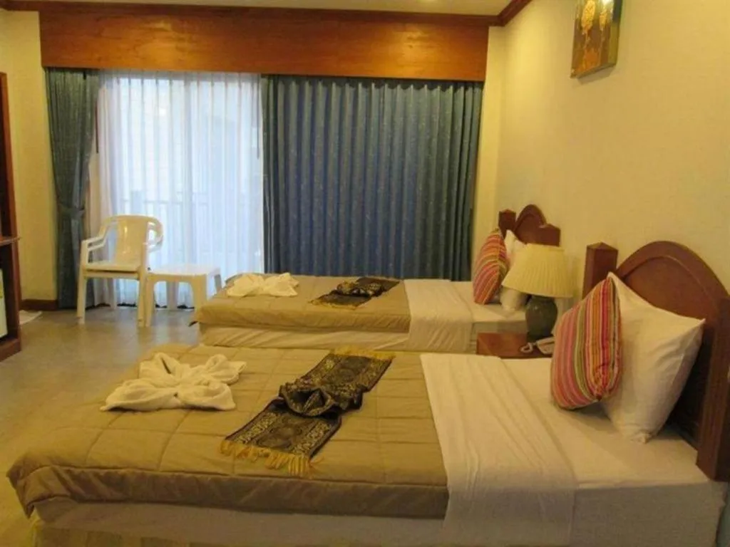 Bed in MT Hotel Patong