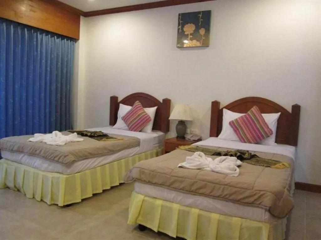 Bed in MT Hotel Patong