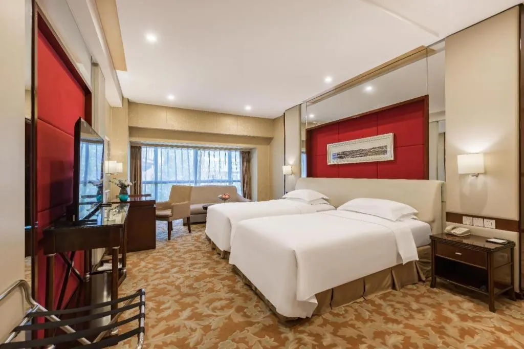 Bed in West International Trade Grand Hotel