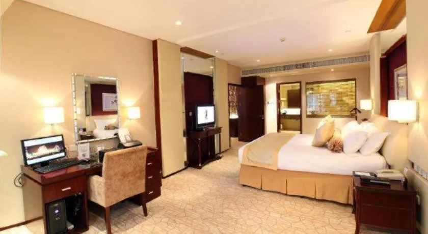 Bed in West International Trade Grand Hotel