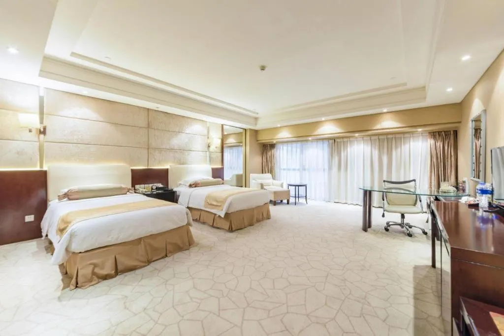 Bed in West International Trade Grand Hotel