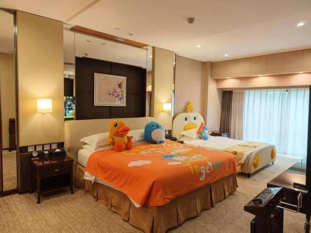 Bed in West International Trade Grand Hotel