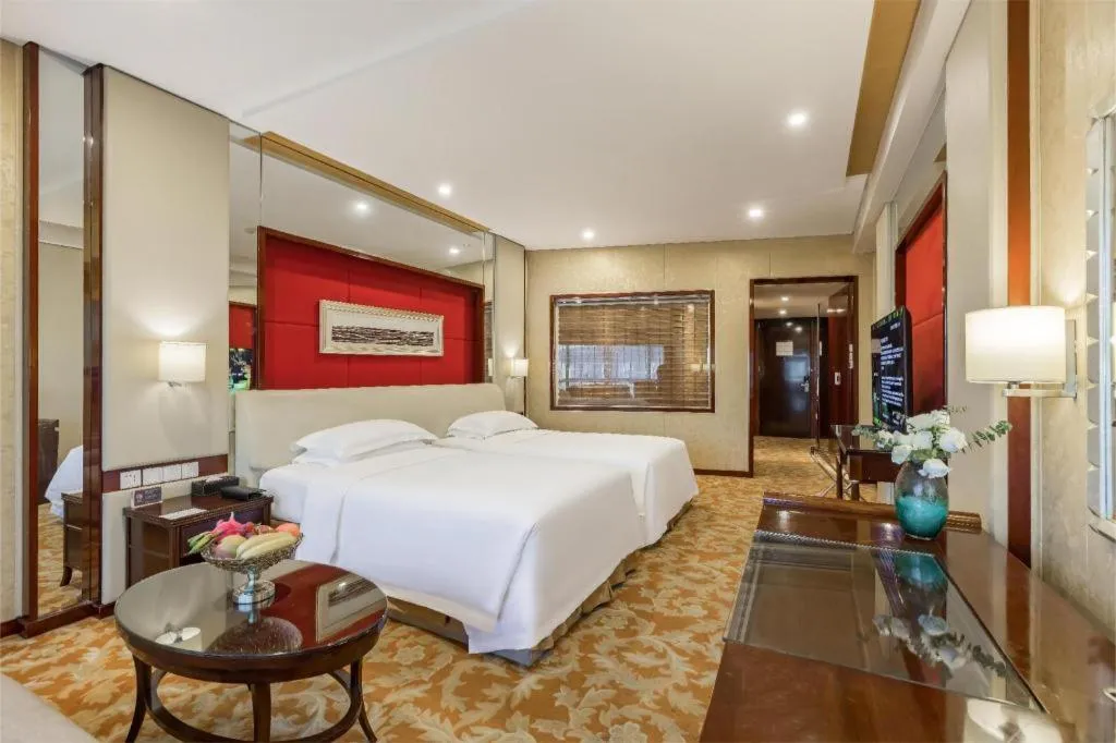 Bed in West International Trade Grand Hotel