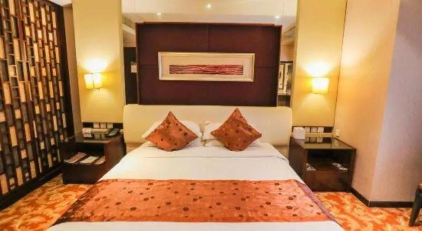 Bed in West International Trade Grand Hotel