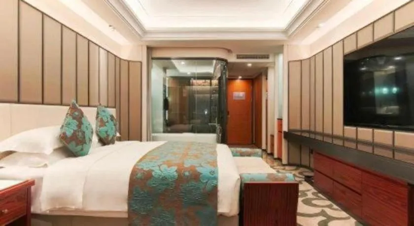 Bed in West International Trade Grand Hotel