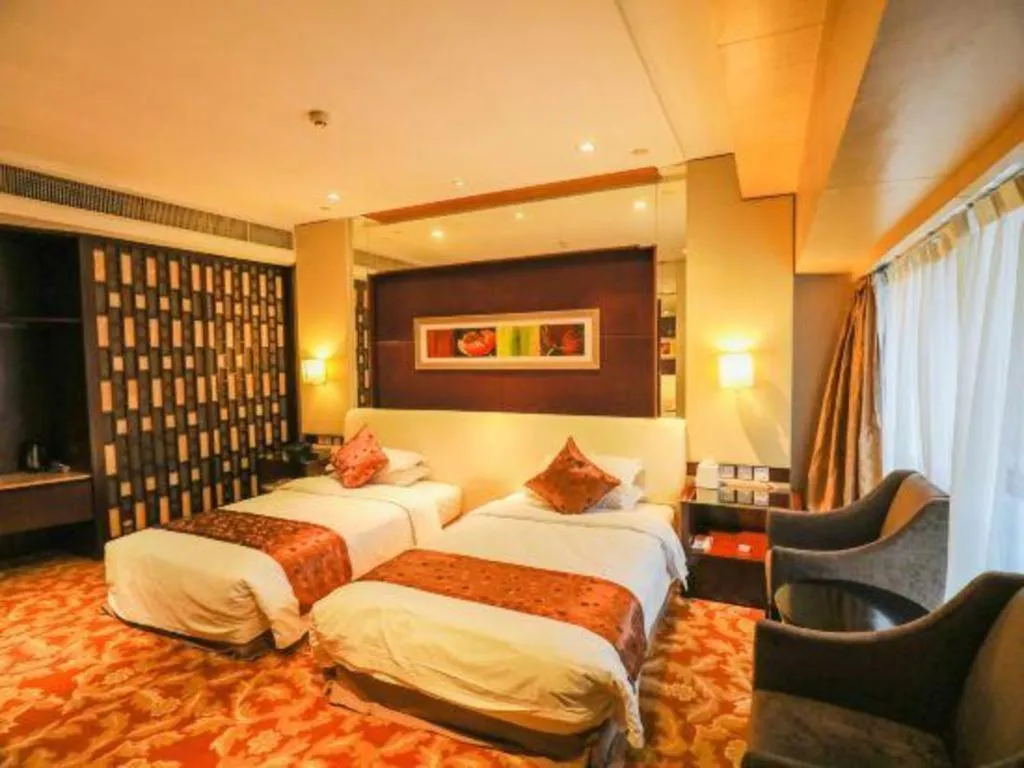 Bed in West International Trade Grand Hotel