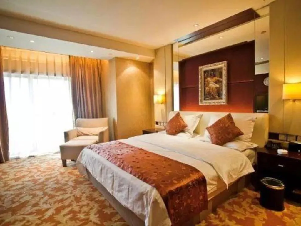 Bed in West International Trade Grand Hotel