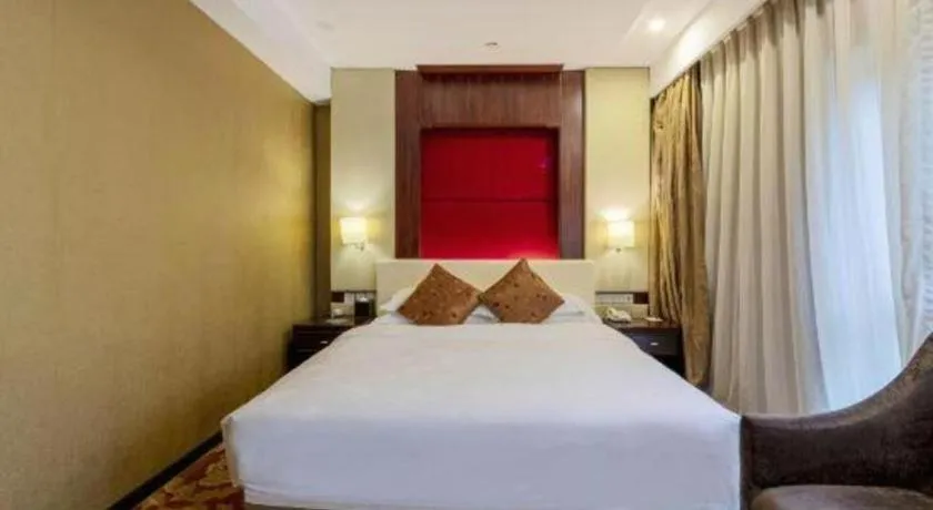 Bed in West International Trade Grand Hotel