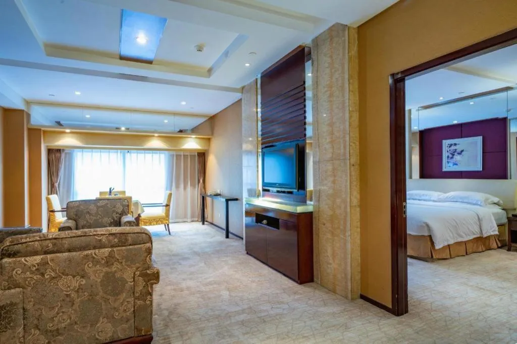 Bed in West International Trade Grand Hotel