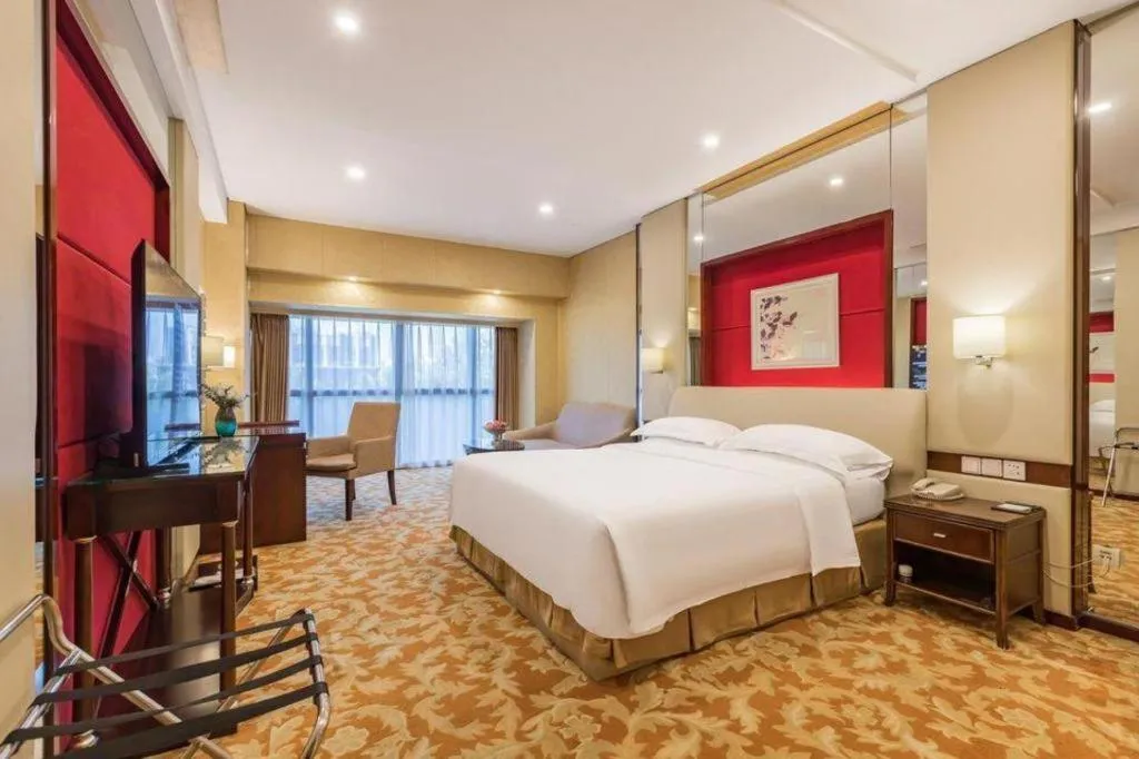 Bed in West International Trade Grand Hotel