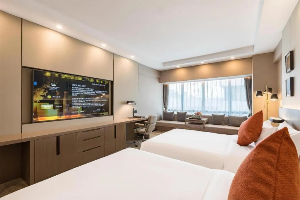 Bed in West International Trade Grand Hotel