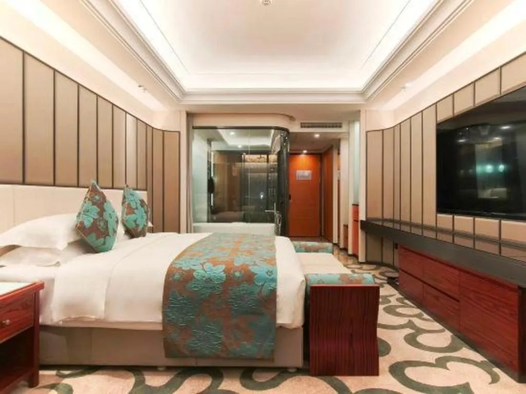 Bed in West International Trade Grand Hotel