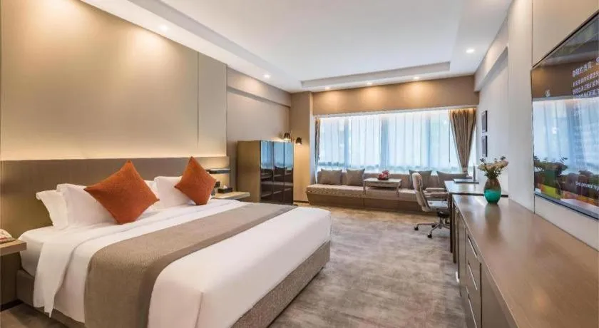 Bed in West International Trade Grand Hotel