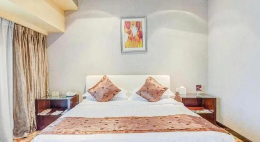 Bed in West International Trade Grand Hotel