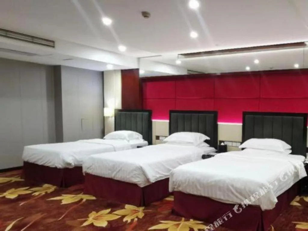 Bed in West International Trade Grand Hotel