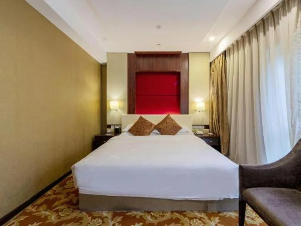 Bed in West International Trade Grand Hotel