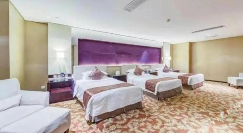 Bed in West International Trade Grand Hotel