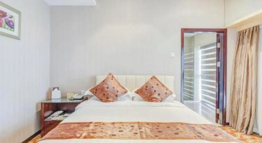 Bed in West International Trade Grand Hotel