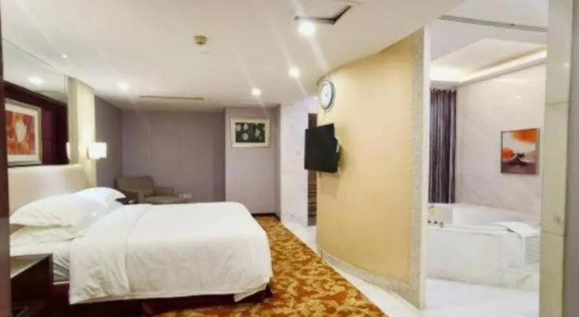 Bed in West International Trade Grand Hotel