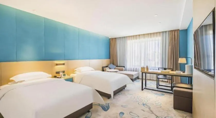 Bed in Beijing Ruyi Business Hotel