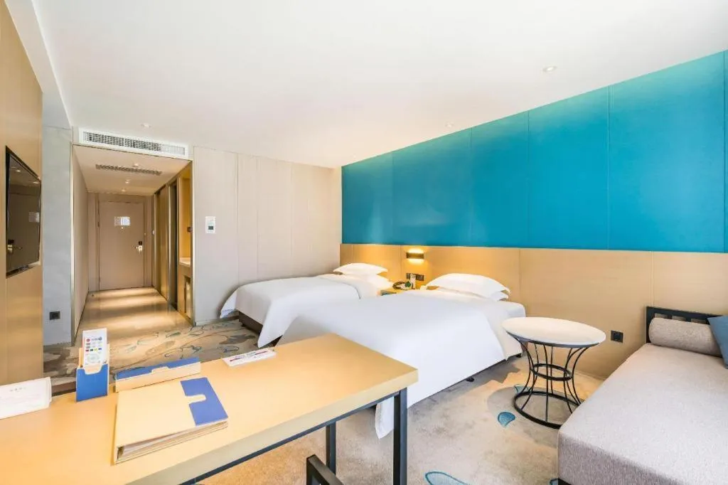 Bed in Beijing Ruyi Business Hotel