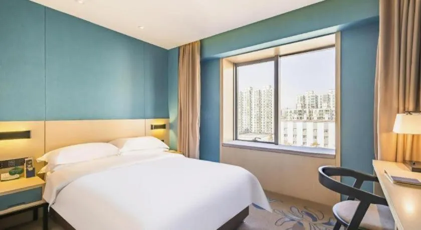 Bed in Beijing Ruyi Business Hotel