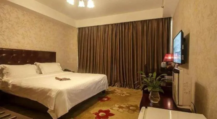 Bed in Beijing Ruyi Business Hotel