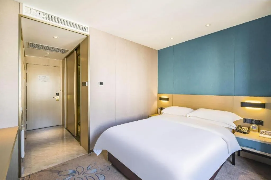 Bed in Beijing Ruyi Business Hotel