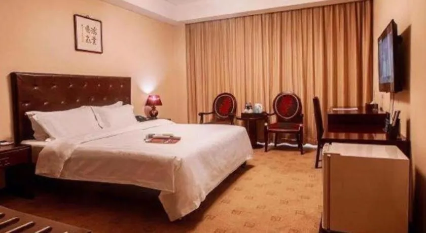 Bed in Beijing Ruyi Business Hotel