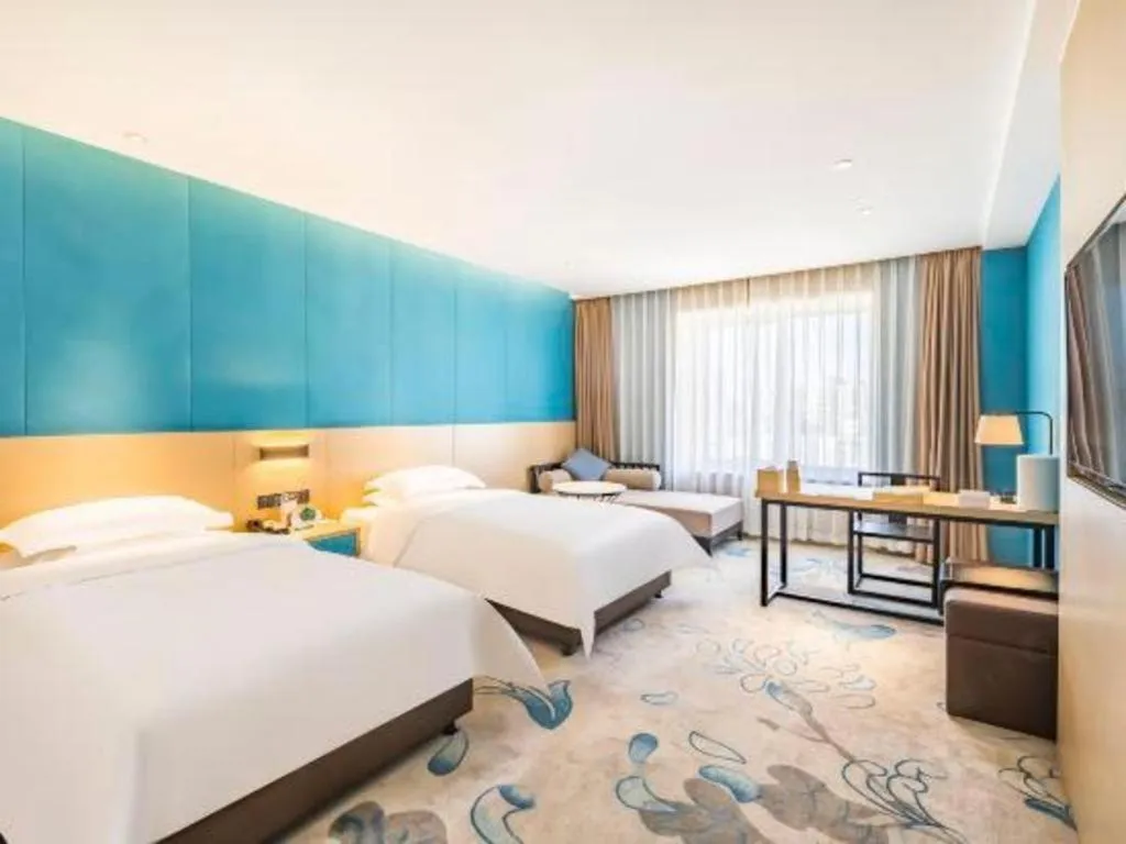 Bed in Beijing Ruyi Business Hotel