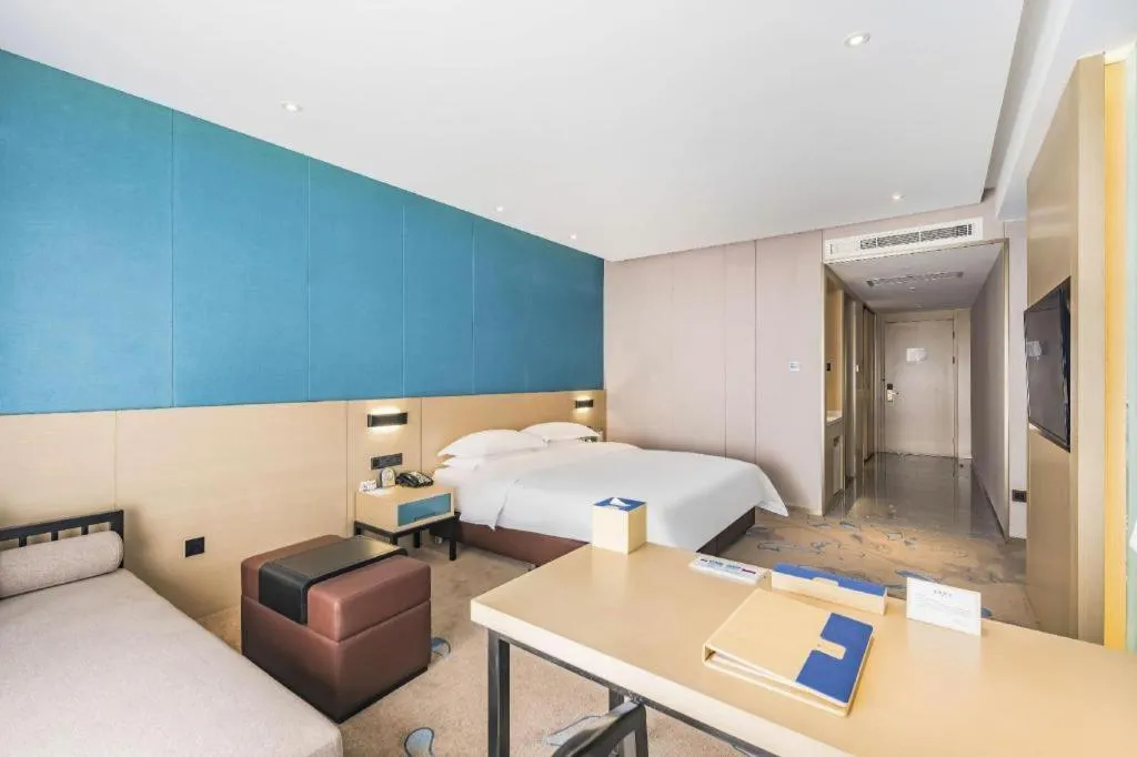 Bed in Beijing Ruyi Business Hotel