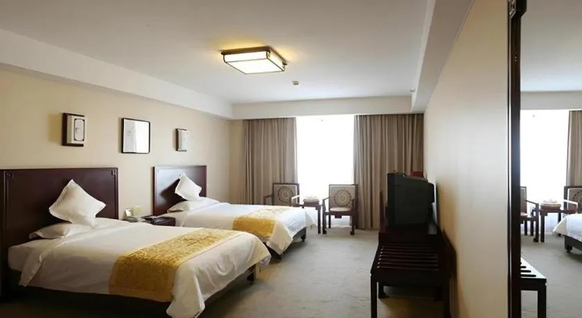 Bed in Beijing Ruyi Business Hotel