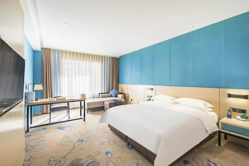 Bed in Beijing Ruyi Business Hotel